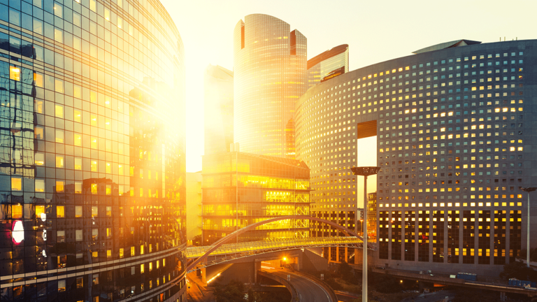 Bright sunlight shining on various business building